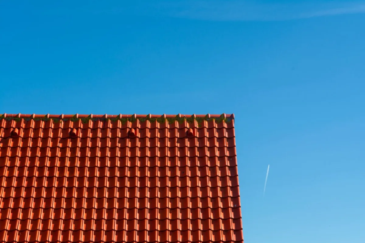 Tile roof gable in full sun, the kind of exposure that sets roof life in Kingman, AZ
